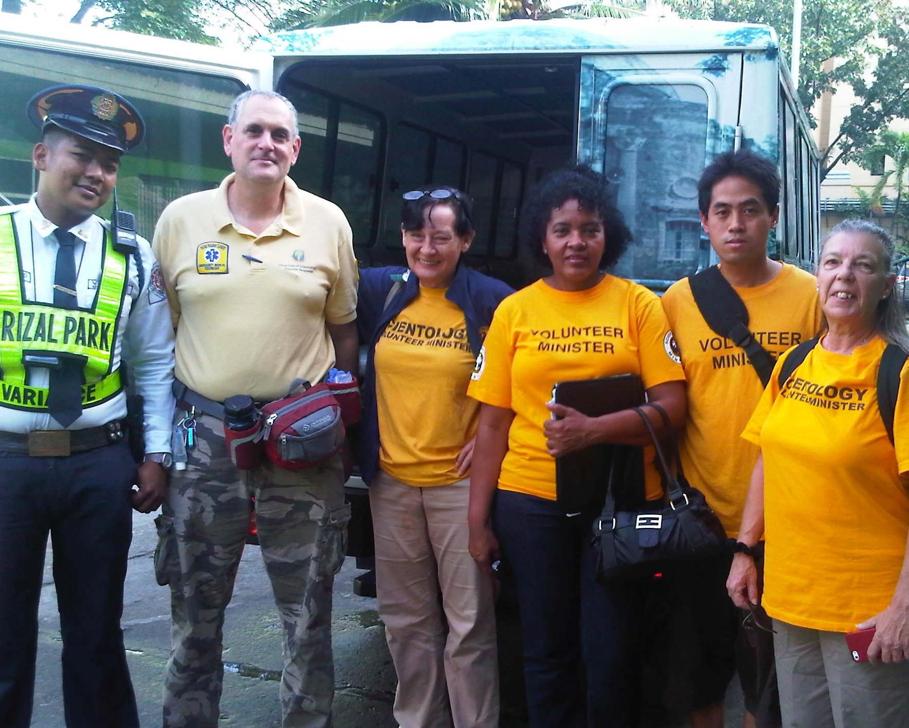 Veteran First Responder Ayal Lindeman and Marion Whitta (second and third from left) head up the Scientology Volunteer Ministers Yolanda (Haiyan) Disaster Response.