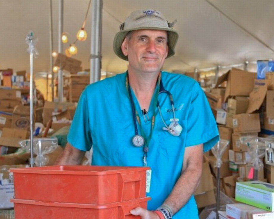 Ayal Lindeman, organizing donations of urgently needed surgical supplies in a tent at the Port-au-Prince airport.