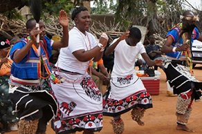 Local sangomas (traditional healers) perform for King and Queen Molefe and the Volunteer Ministers.