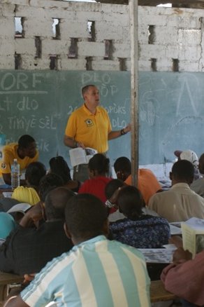 Ayal Lindeman (center), delivering a seminar on community health and first-aid in Carrefour, Haiti.