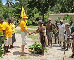 In a traditional ceremony of welcome, Paramount Chief of Savulei welcomes the Scientology Volunteer Ministers to the village of Lambi.